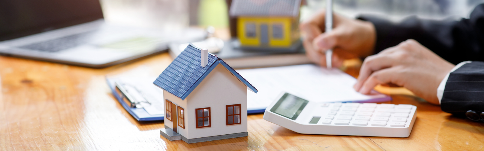 Model houses illustrating home financing for Denver buyers