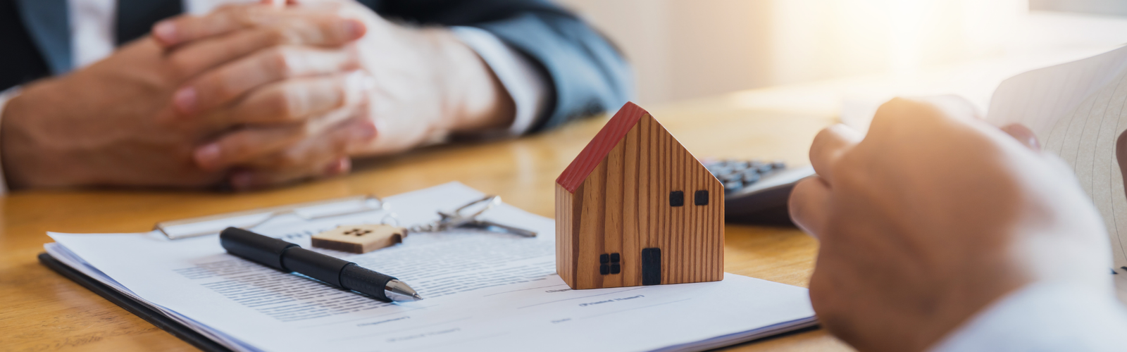 Model houses illustrating home financing for Englewood buyers